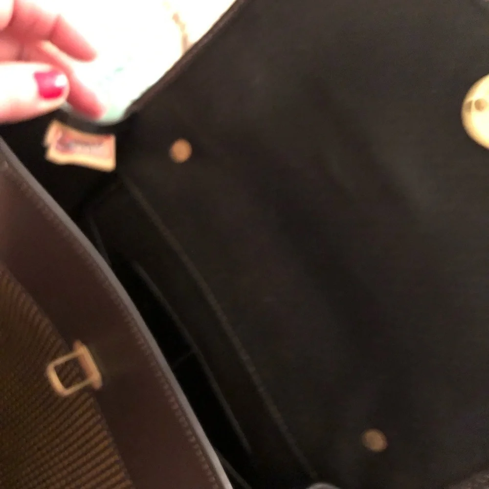 Dooney & Bourke Cabrio black leather laser cut w/ tag & serial number, vintage
